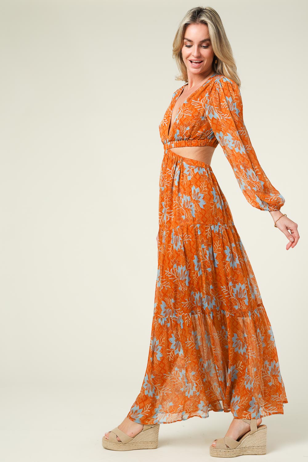 Elegante Jurk Met Cut Out Taille En Slangenmotief